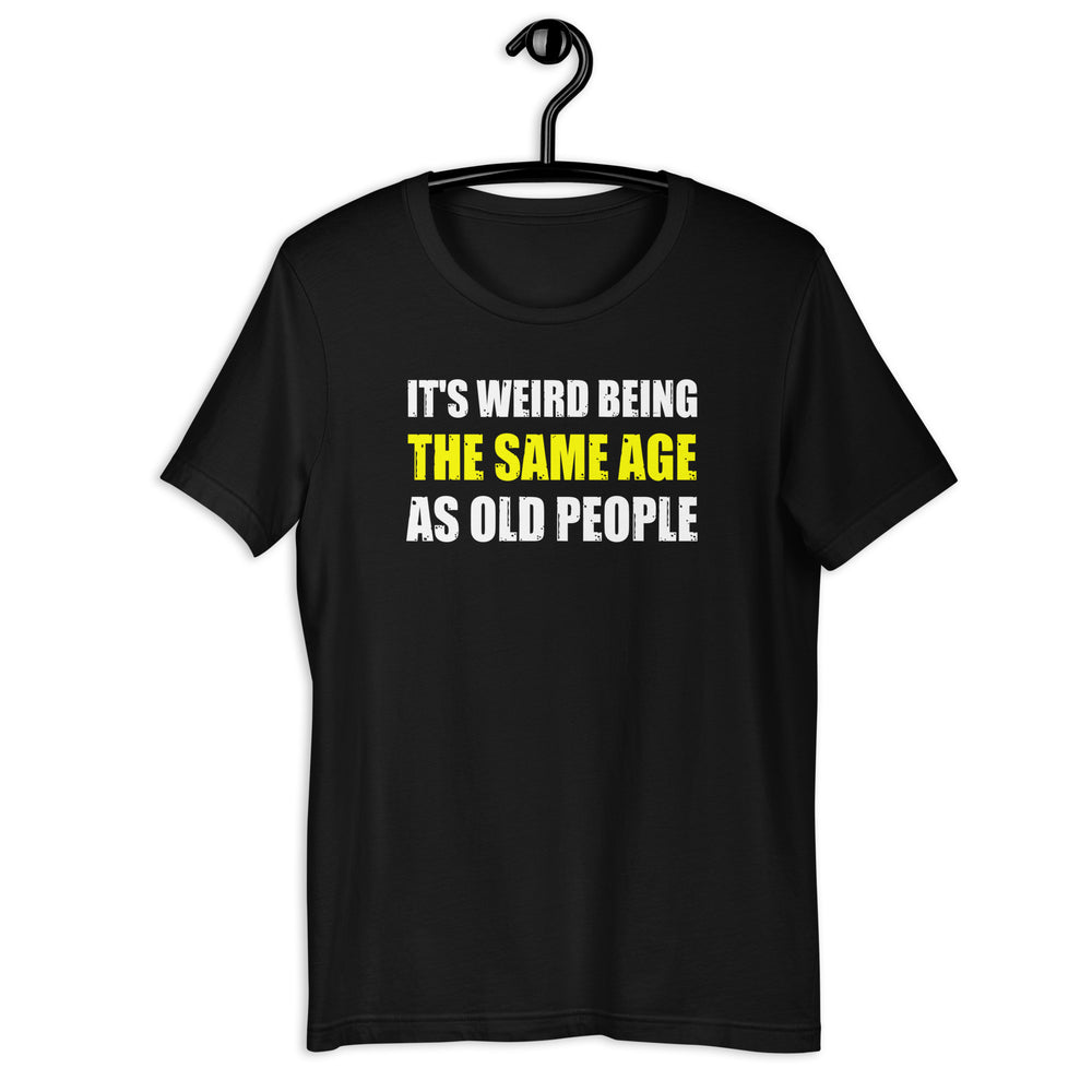 The "It's Weird Being the Same Age as Old People" Funny T-Shirt is a humorous and relatable way to express the feeling of being surrounded by individuals who are older in age. The shirt features bold and attention-grabbing text in a playful font that reads "It's Weird Being the Same Age as Old People."