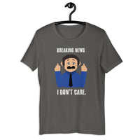 Load image into Gallery viewer, The "Breaking News - I Don't Care" Awkward Puppets Diego MEME T-shirt is a bold and humorous way to express a carefree attitude and a lighthearted approach to current events. This t-shirt features a creative design that combines elements of Awkward Puppets, meme culture, and the phrase "Breaking News - I Don't Care."
