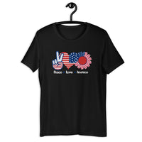 Load image into Gallery viewer, The "Peace Love America" T-shirt is a stylish and positive way to express your love and support for the United States, emphasizing the values of peace and unity. This t-shirt features a simple yet impactful design that combines the universally recognized peace symbol, a heart symbol, and the word "America."
