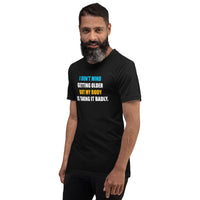 Load image into Gallery viewer, I Don't Mind Getting Older But My Body Is Taking It Badly t-shirt - SHOPNOO
