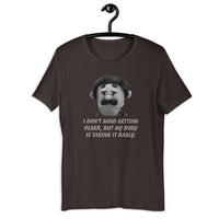 Load image into Gallery viewer, I Don't Mind Getting Older But My Body Is Taking It Badly t-shirt - SHOPNOO
