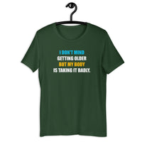 Load image into Gallery viewer, I Don't Mind Getting Older But My Body Is Taking It Badly t-shirt - SHOPNOO
