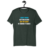 Load image into Gallery viewer, I Don't Mind Getting Older But My Body Is Taking It Badly t-shirt - SHOPNOO
