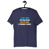 Load image into Gallery viewer, I Don't Mind Getting Older But My Body Is Taking It Badly t-shirt - SHOPNOO
